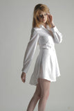 SOPHISTICATED YET SIMPLE. THIS TUNIC SHIRT DRESS IT FLARES OUT AT THE WAIST FOR A PEPLUM EFFECT